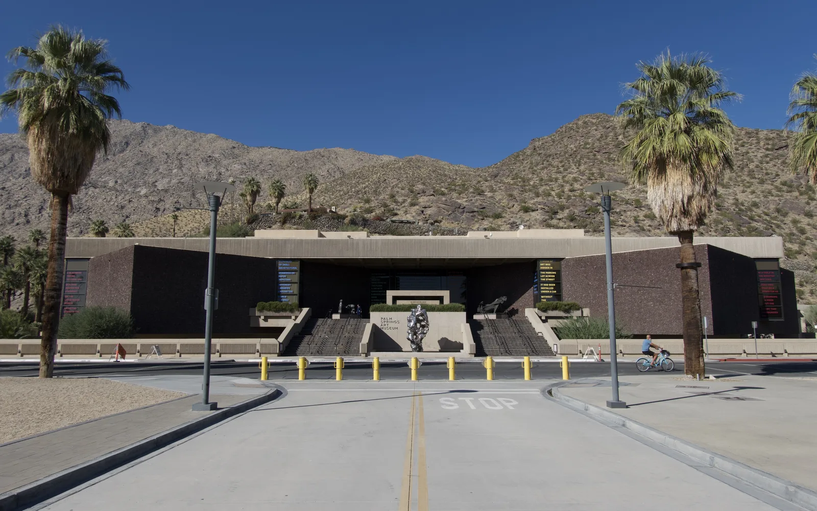 Modern building exterior of the Palm Springs Art Museum with clean architectural lines and desert landscaping